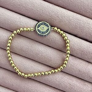 Gold Beaded Evil Eye Bracelet with purple